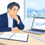 社長が月ごとのアクセス数のグラフを見て目安を考えている様子