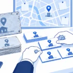 古い会社情報と新しい会社情報を見比べて整える机の上のイメージ